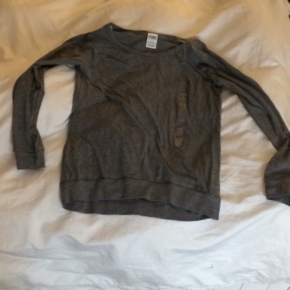 Victoria’s Secret pink shirt.